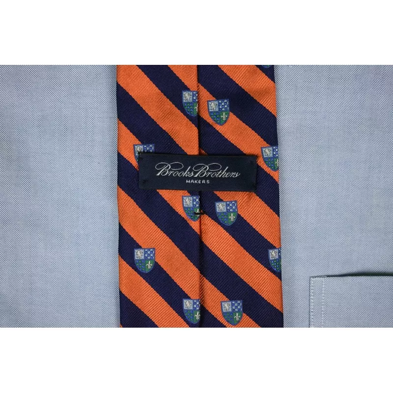 “Brooks Brothers Orange/ Navy Repp Stripe English Silk Tie w/ Heraldic Crest Motif” (SOLD)